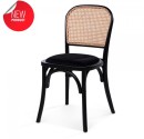 Stackable wooden café chair, with a black velvet seat and rattan back. 